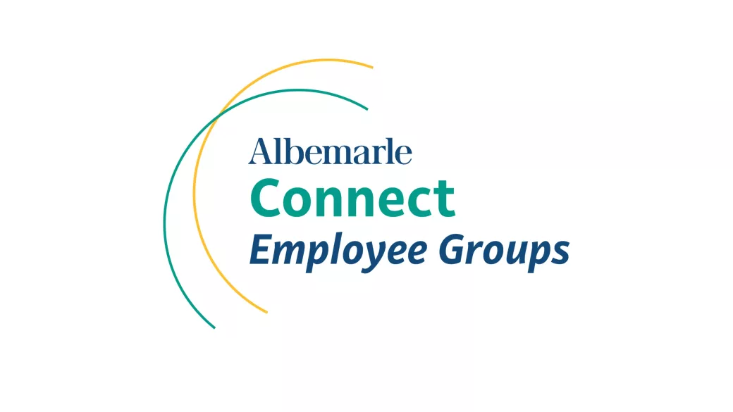 Logo with a design composed of two curved lines: one yellow and one green, intersecting near the top left. The text reads: "Albemarle Connect Employee Groups" with "Albemarle" in dark blue, "Connect" in green, and "Employee Groups" in dark blue.