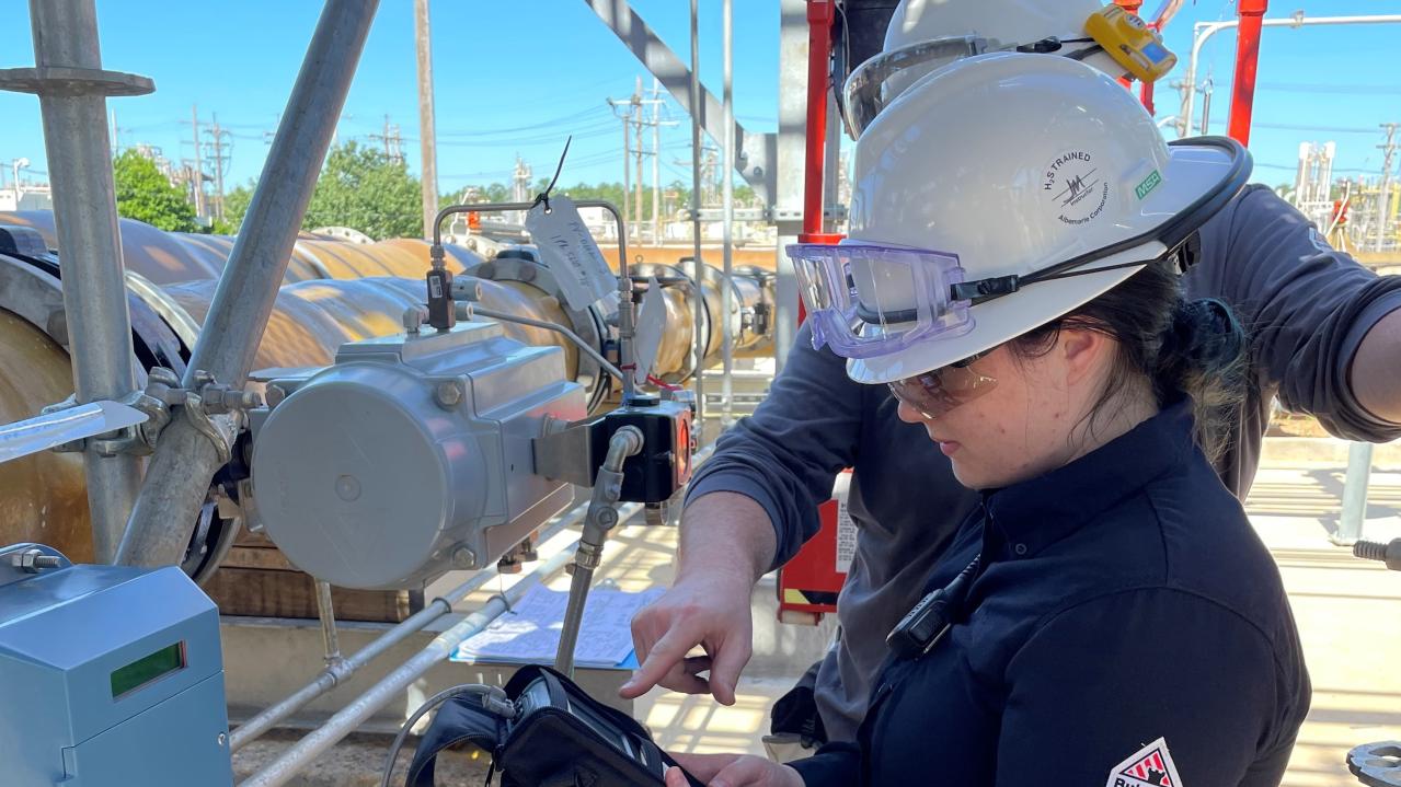 Intern working at a plant