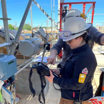 Intern working at a plant