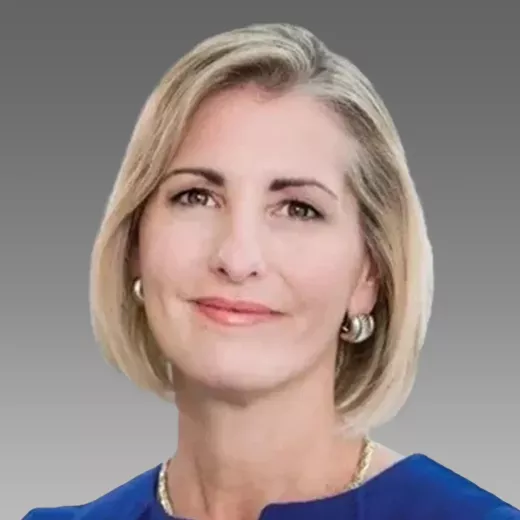 Headshot of Melissa Anderson, Executive Vice President and Chief People Officer, who has short blonde hair, wearing a blue blouse and small round earrings, smiling.